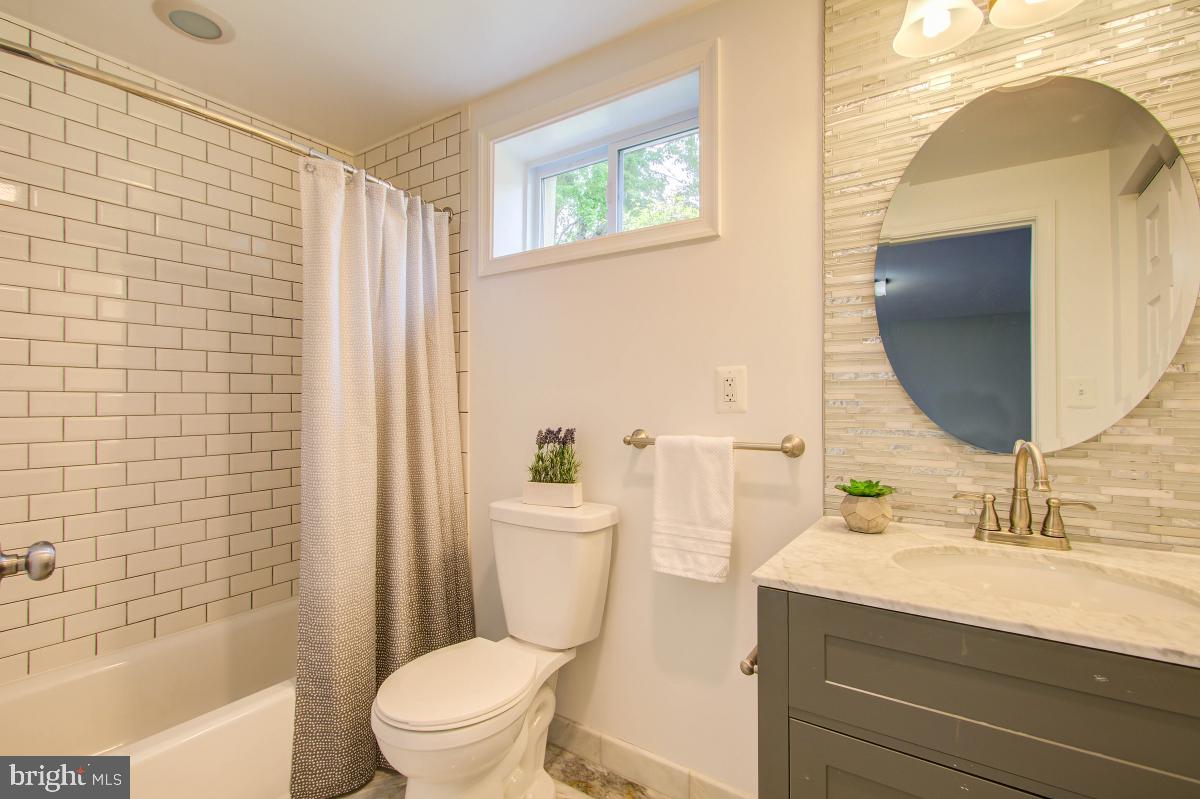 11206 Rock Road Rockville, MD 20852 - Photo 32 of 37 Renovated and expanded full bath w/tub.