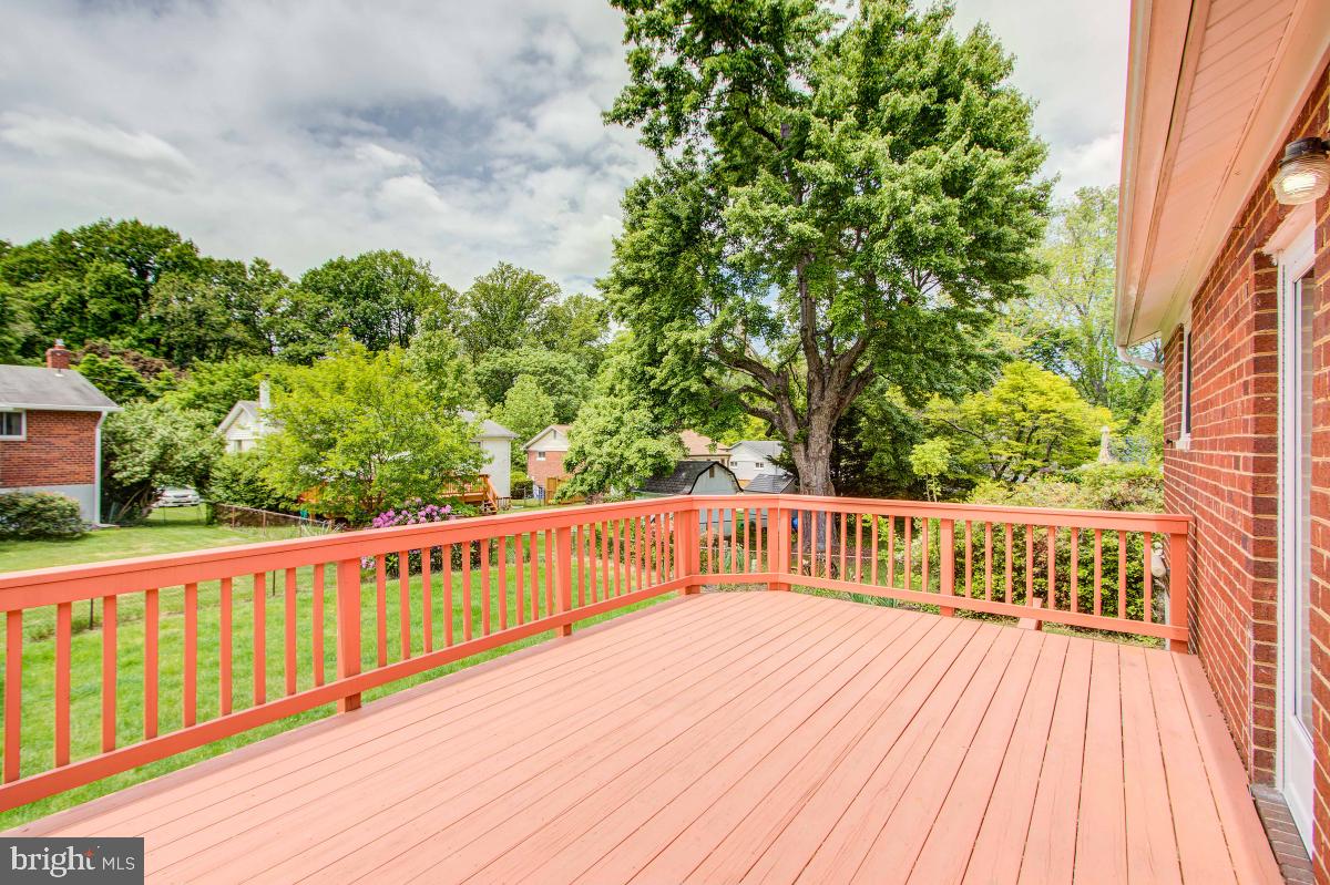 11206 Rock Road Rockville, MD 20852 - Photo 33 of 37 Huge deck overlooking pretty yard.