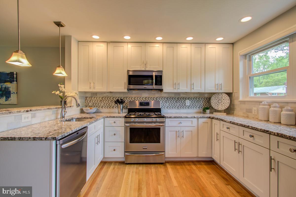 11206 Rock Road Rockville, MD 20852 - Photo 10 of 37 White 42" cabinets w/soft close feature.