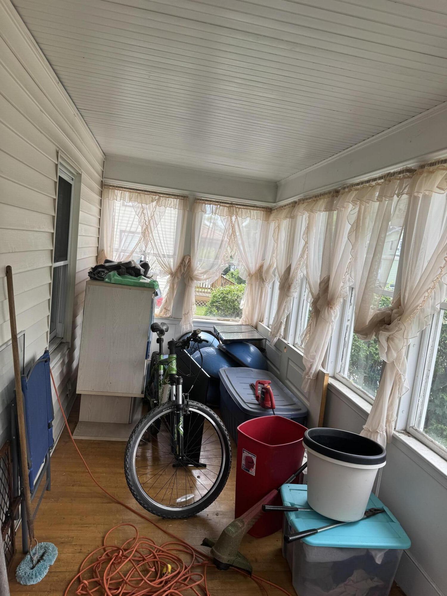 63 Washington Street Augusta, ME 04330 - Photo 13 of 22 Enclosed front porch
