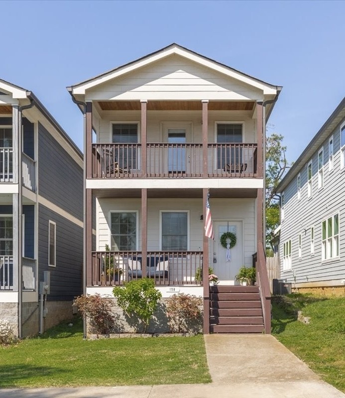 175 B Rural Avenue Nashville, TN 37209 - Photo 1 of 26 a front view of a house with garden