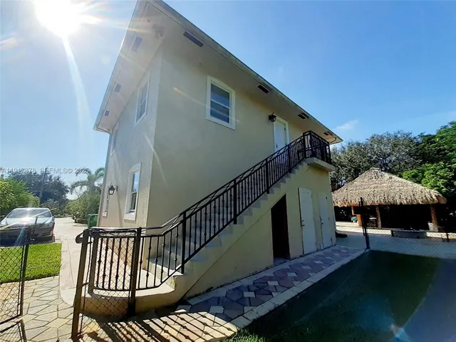 a view of a deck with furniture