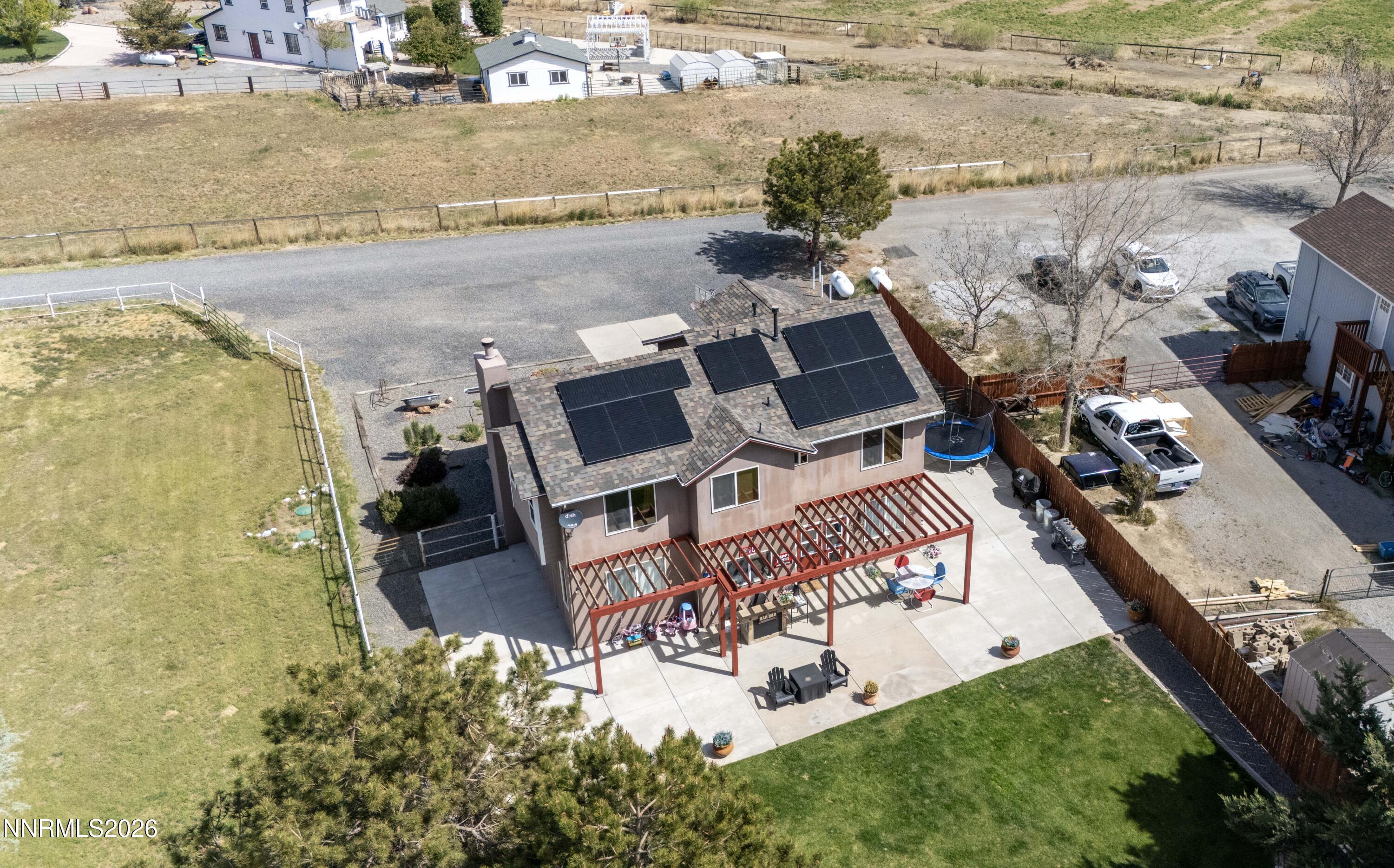765 Stock Lane Fernley, NV 89408 - Photo 5 of 34 an aerial view of residential houses with outdoor space
