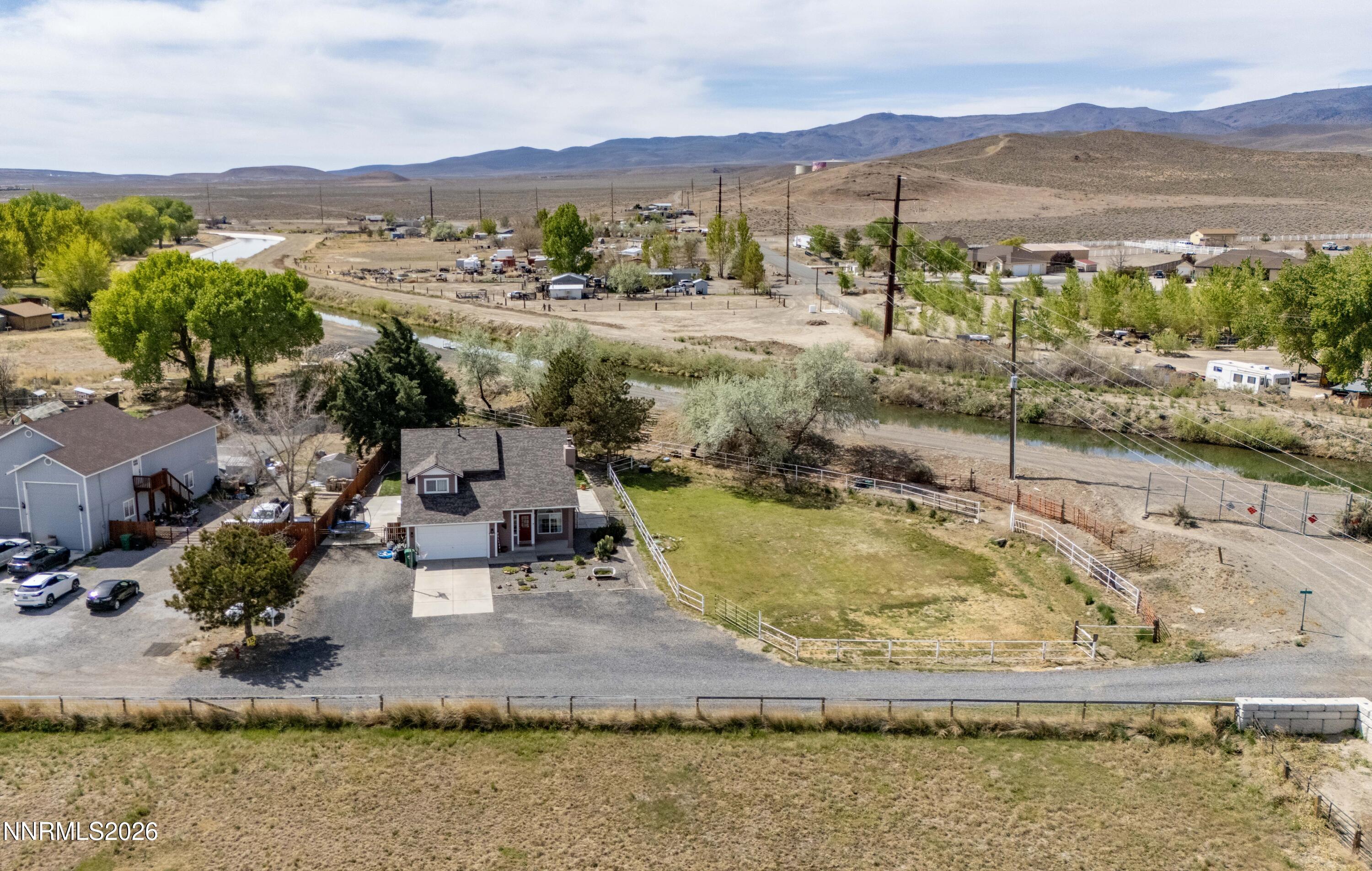 765 Stock Lane Fernley, NV 89408 - Photo 6 of 34 a view of a lake with a mountain