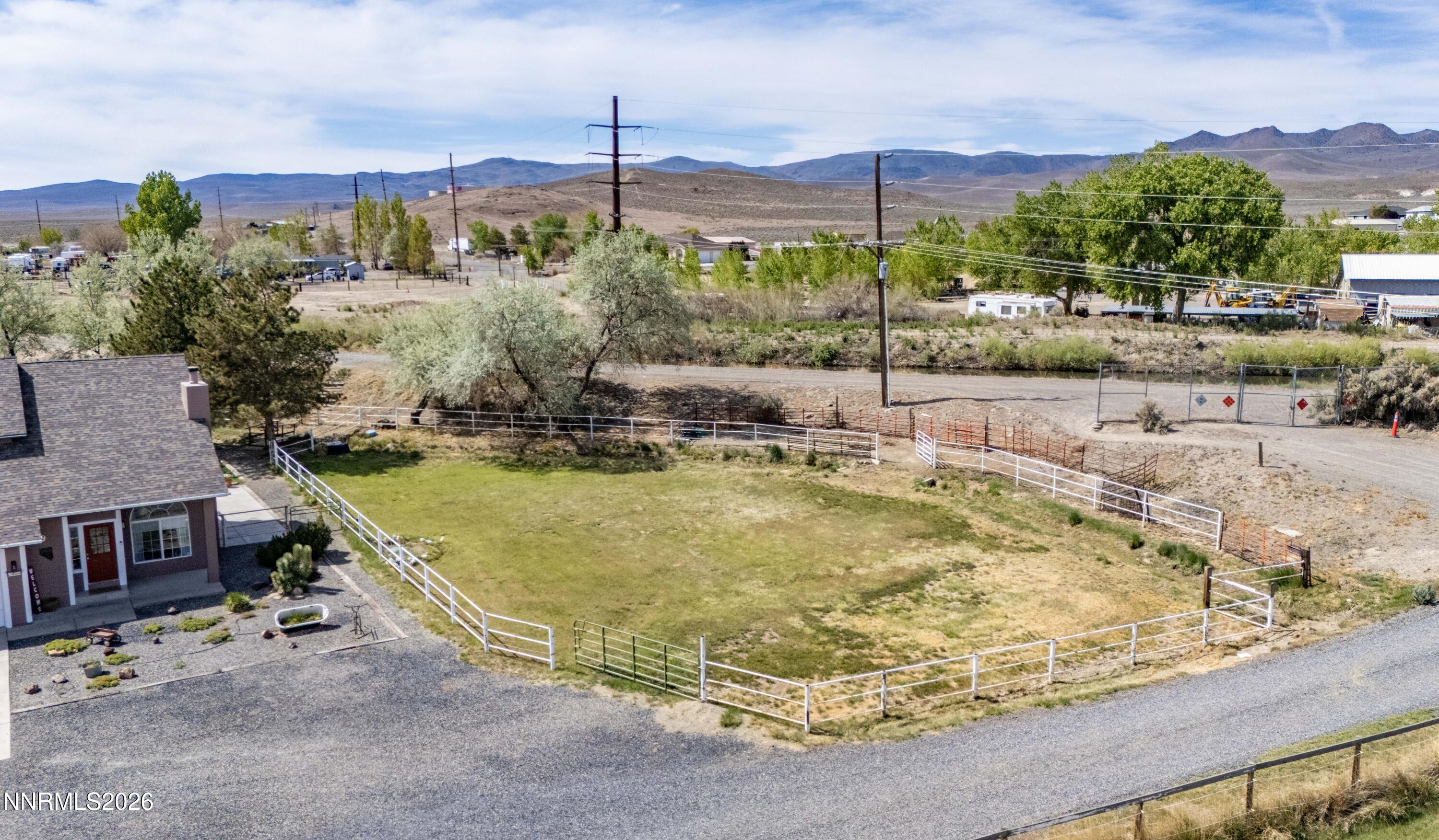 765 Stock Lane Fernley, NV 89408 - Photo 7 of 34 a view of a swimming pool with a patio and a view of a swimming pool