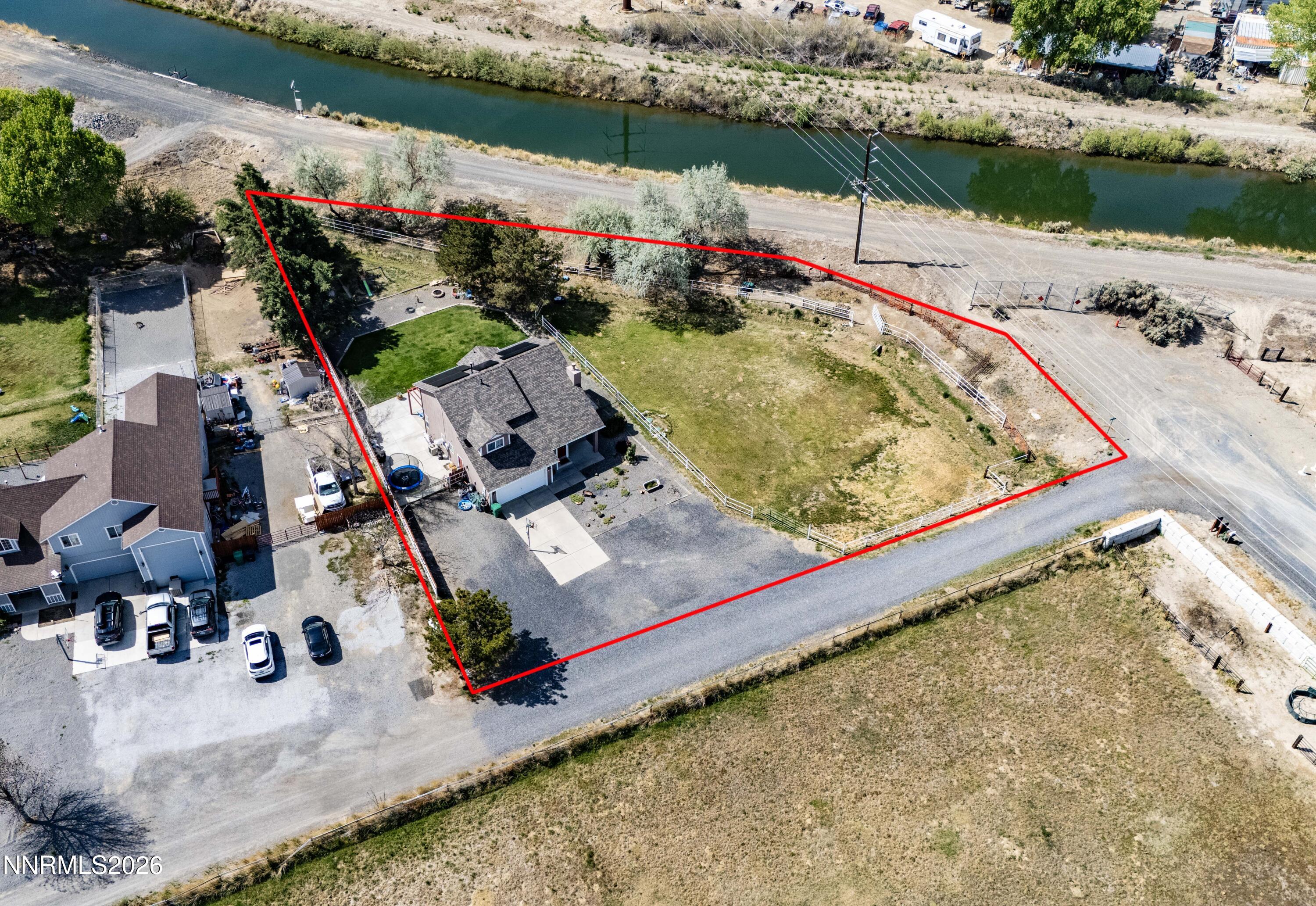 765 Stock Lane Fernley, NV 89408 - Photo 8 of 34 an aerial view of a house with a ocean view
