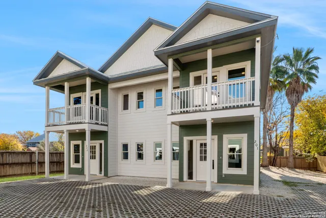 a front view of a house with a porch