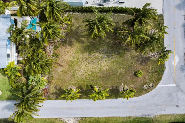 an aerial view of a house with a lake view