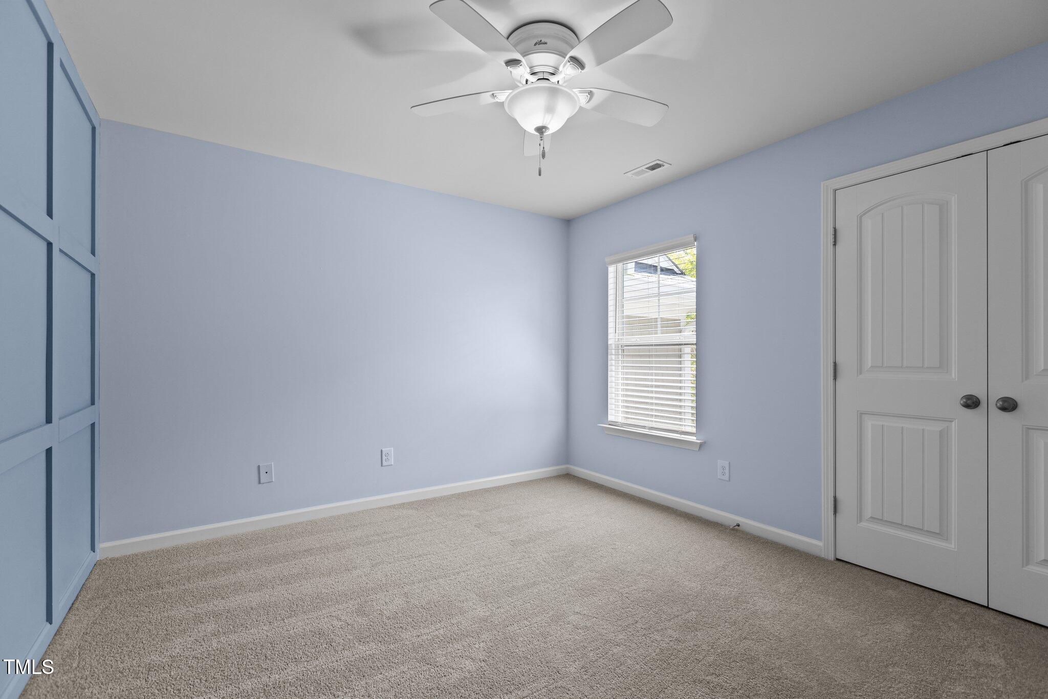 2082 Weston Green Loop Cary, NC 27513 - Photo 39 of 49 a view of an empty room with a window
