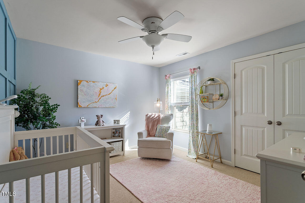 2082 Weston Green Loop Cary, NC 27513 - Photo 41 of 49 a living room with furniture and a table