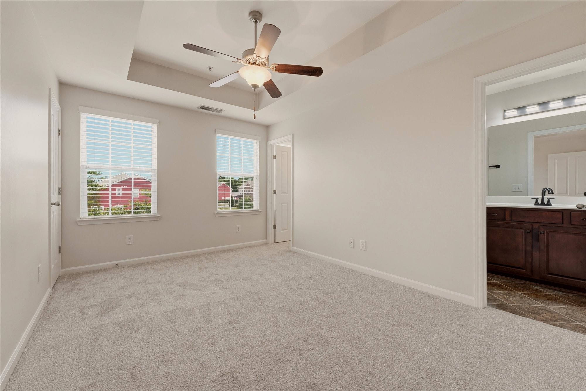 2050 Hemlock Drive Spring Hill, TN 37174 - Photo 15 of 48 an empty room with ceiling fan and windows