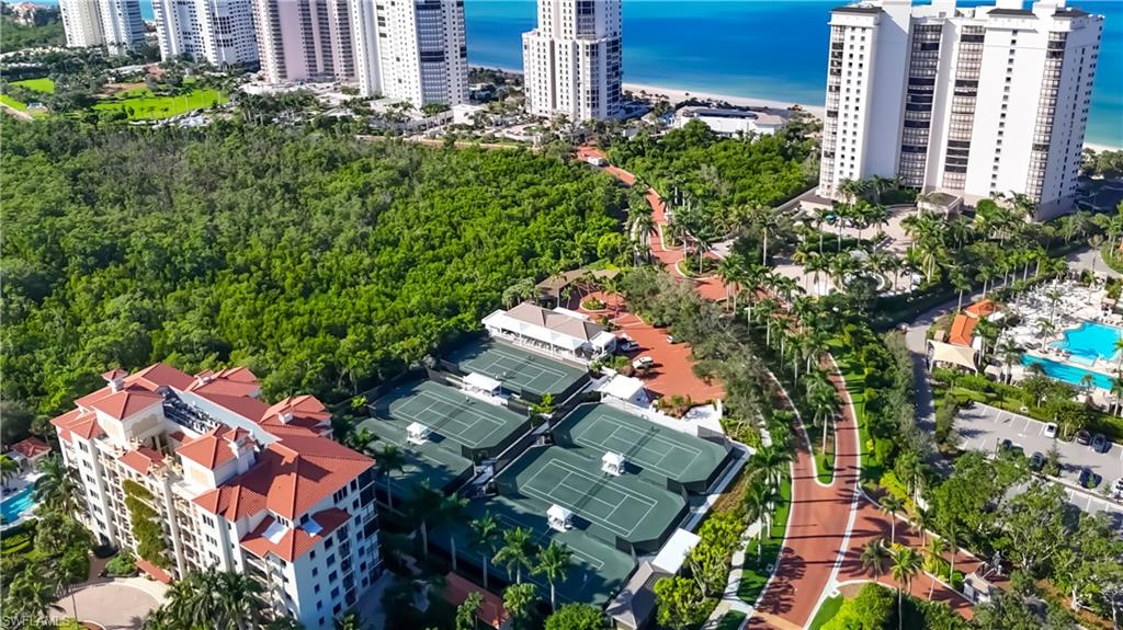 8169 Via Vecchia Naples, FL 34108 - Photo 30 of 33 an aerial view of a city with lots of residential buildings