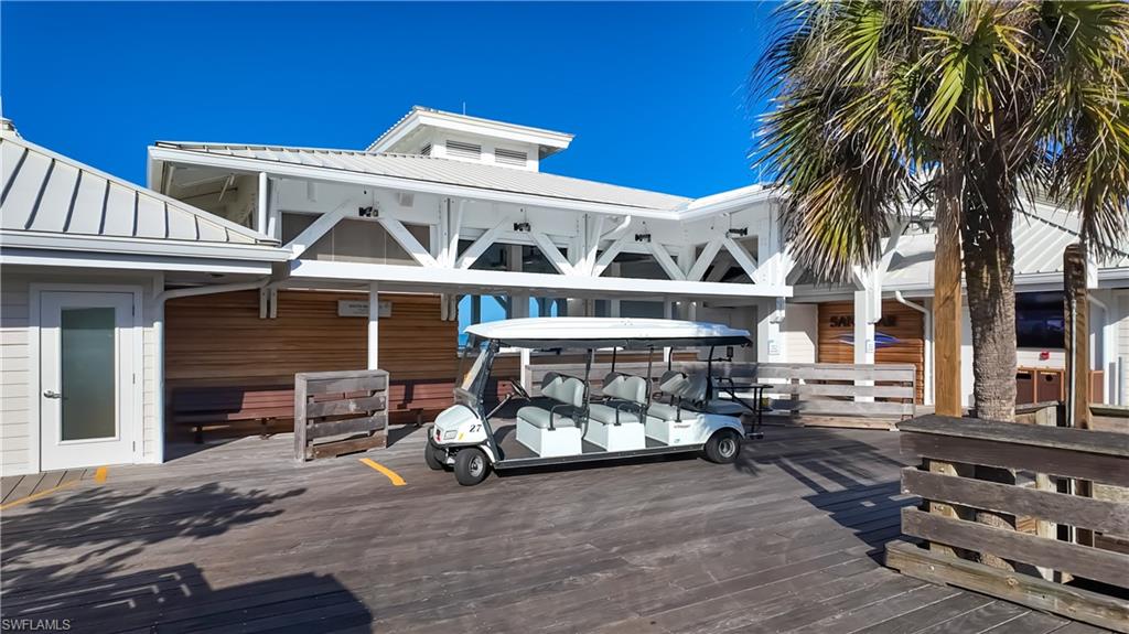 8169 Via Vecchia Naples, FL 34108 - Photo 33 of 33 a view of a car park in front of house