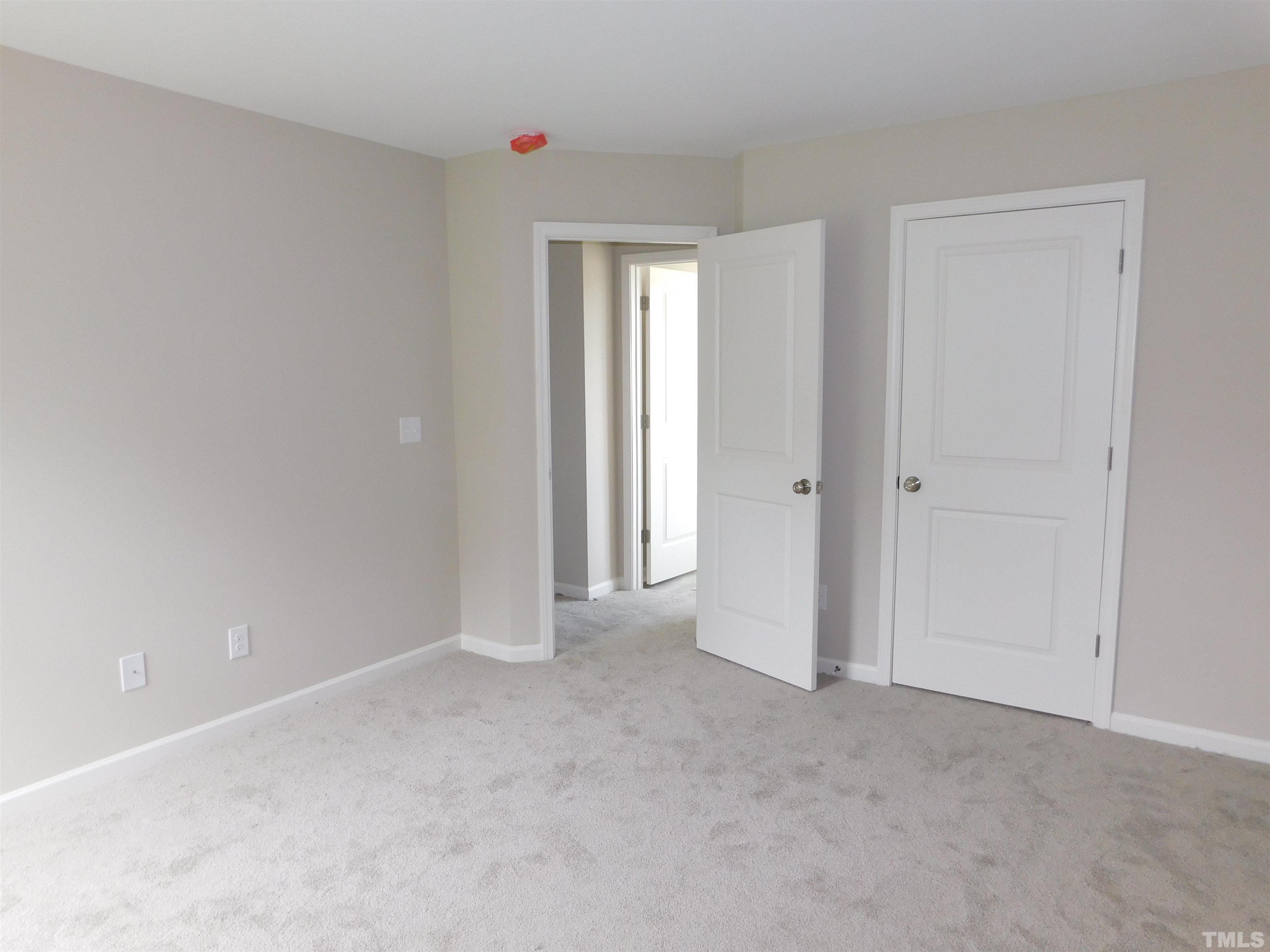 84 Kickoff Circle Benson, NC 27504 - Photo 18 of 21 a view of an empty room