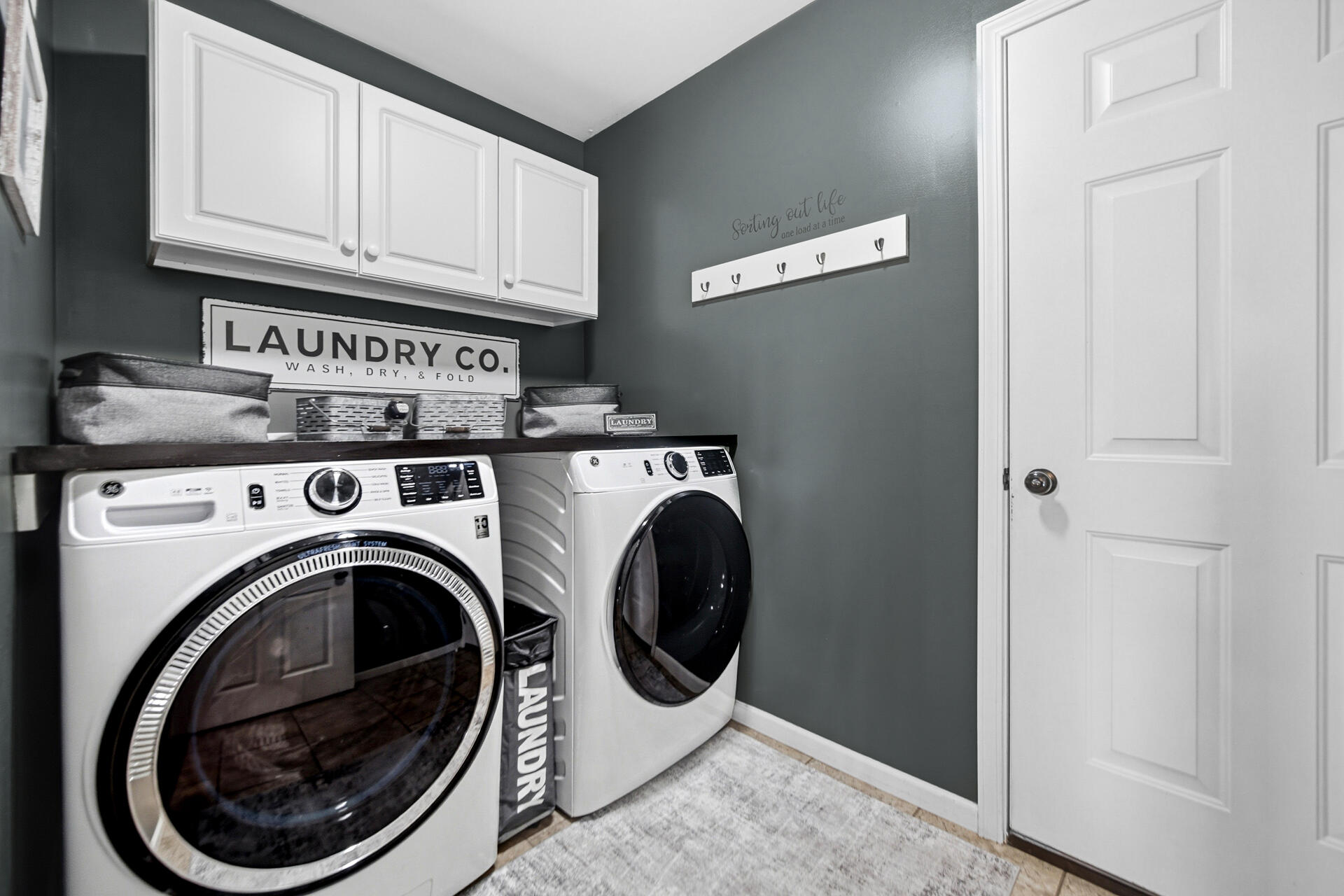 1913 Holly Street Southeast De Motte, IN 46310 - Photo 15 of 42 a utility room with dryer and washer