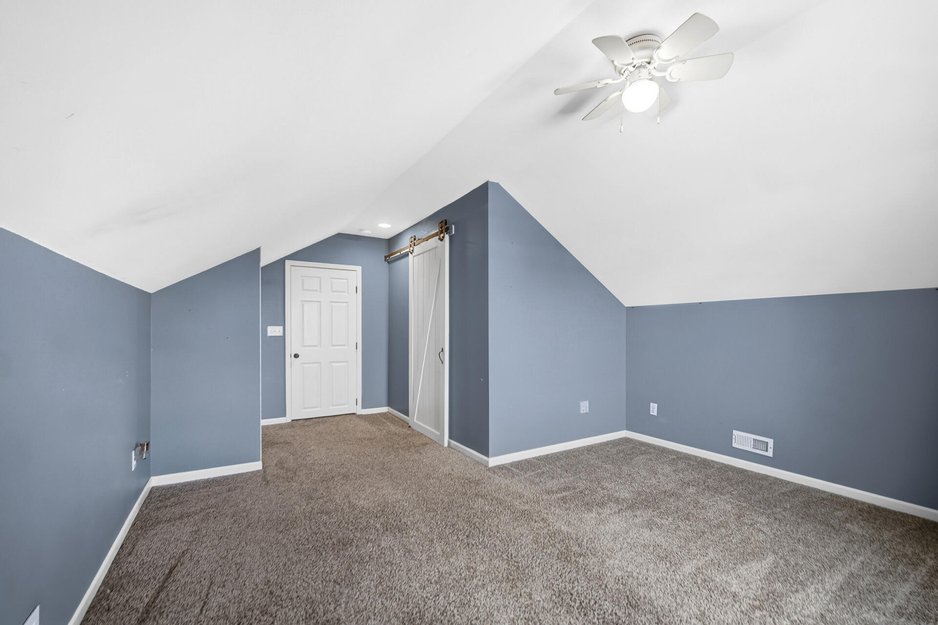 1913 Holly Street Southeast De Motte, IN 46310 - Photo 25 of 42 a view of a big room with carpet