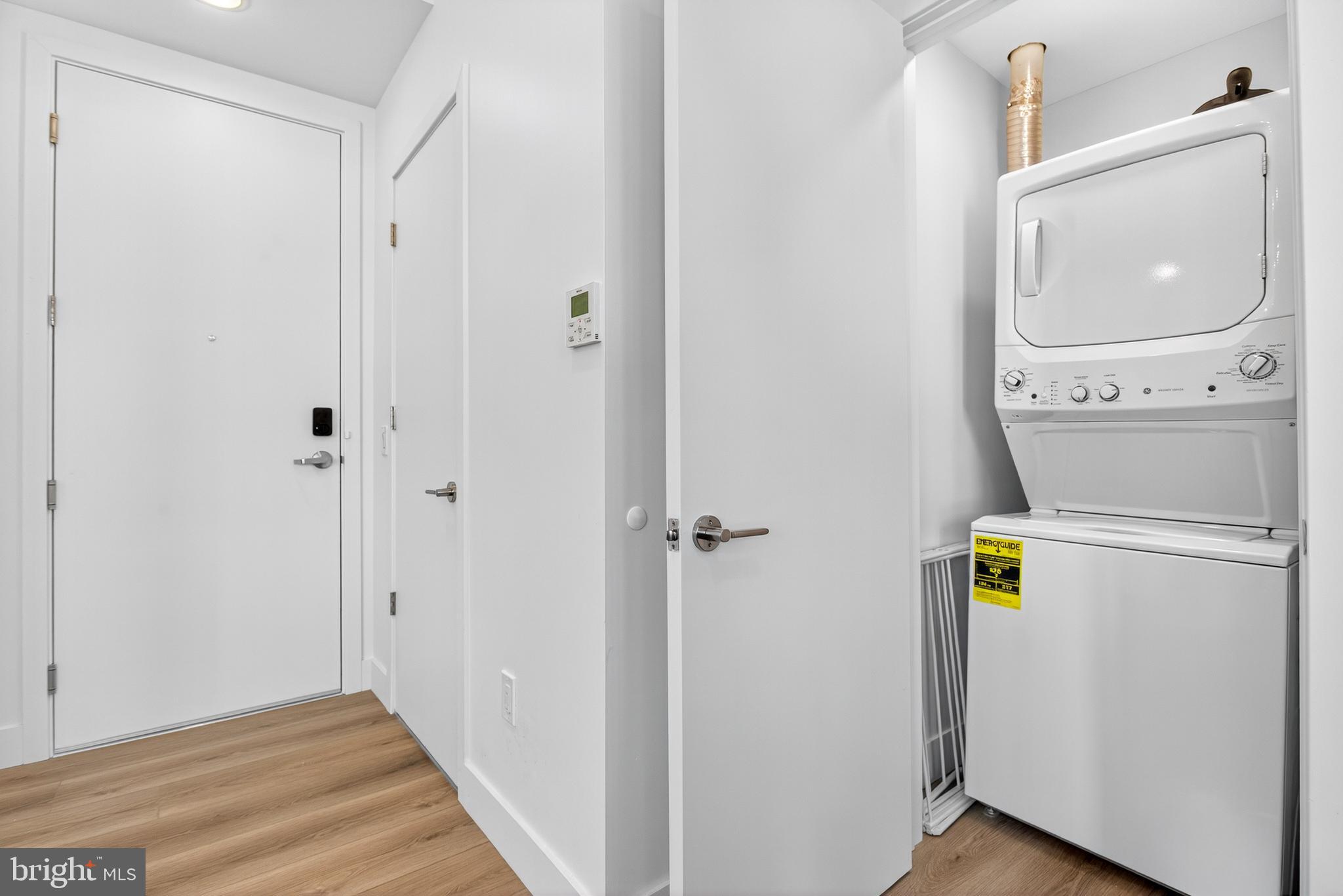 300 Christian Street, Unit 211 Philadelphia, PA 19147 - Photo 17 of 30 a utility room with dryer and washer