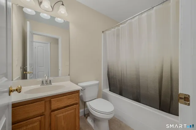 a utility room with closet dryer and washer