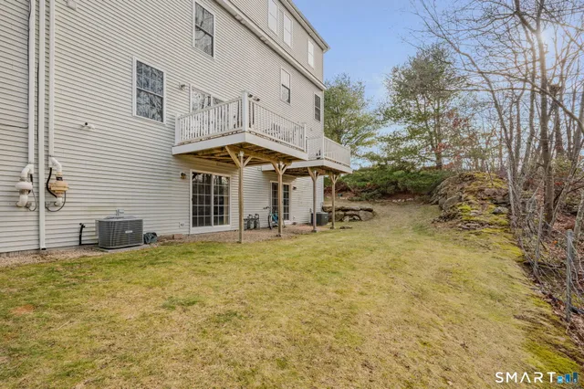 an aerial view of residential house with outdoor space