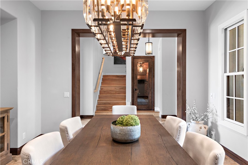 27 Pisano Street Ladera Ranch, CA 92694 - Photo 17 of 71 a living room with furniture and a chandelier