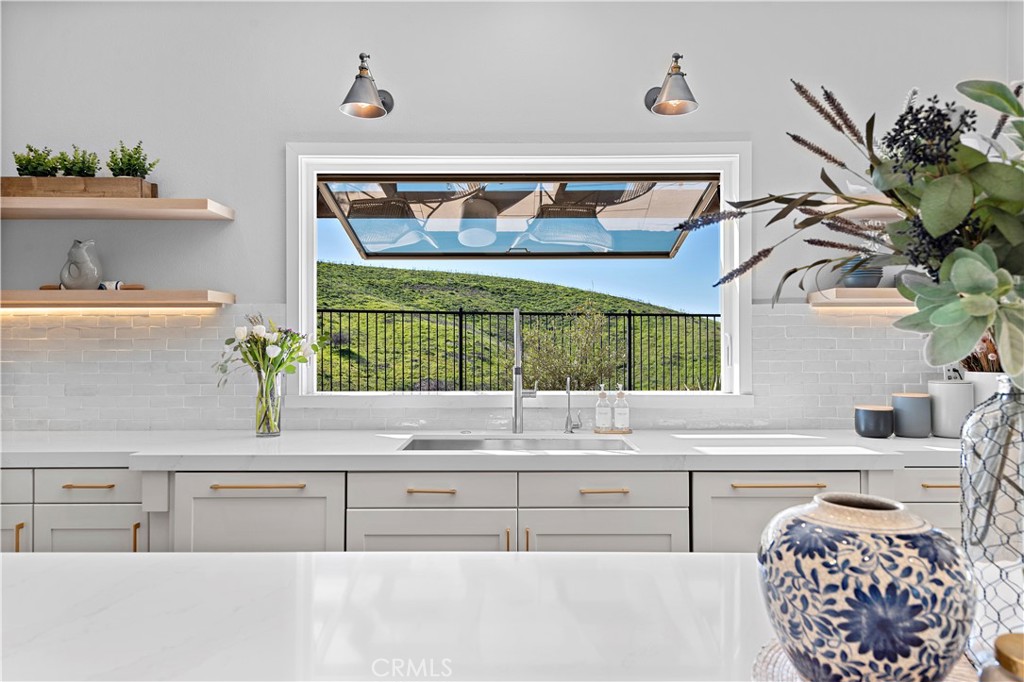 27 Pisano Street Ladera Ranch, CA 92694 - Photo 28 of 71 a bathroom with a sink and a mirror