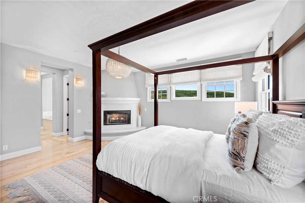 27 Pisano Street Ladera Ranch, CA 92694 - Photo 34 of 71 a bed sitting in a bedroom next to a window