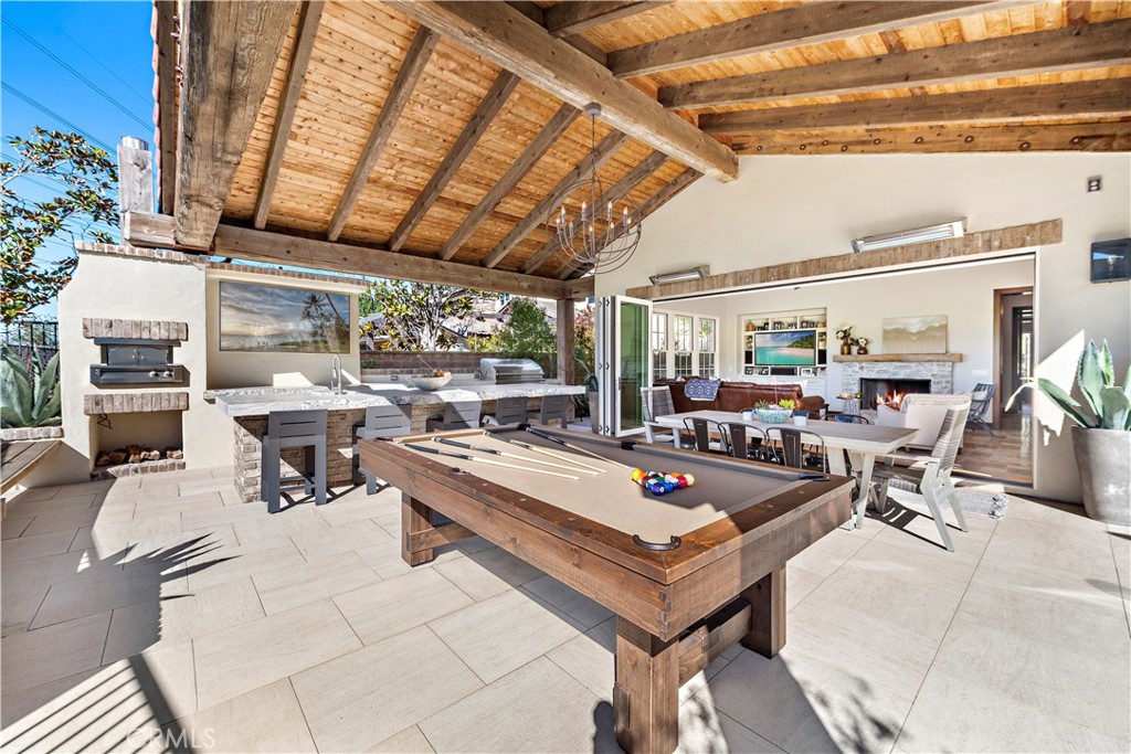 27 Pisano Street Ladera Ranch, CA 92694 - Photo 4 of 71 a living room with furniture a table and chairs
