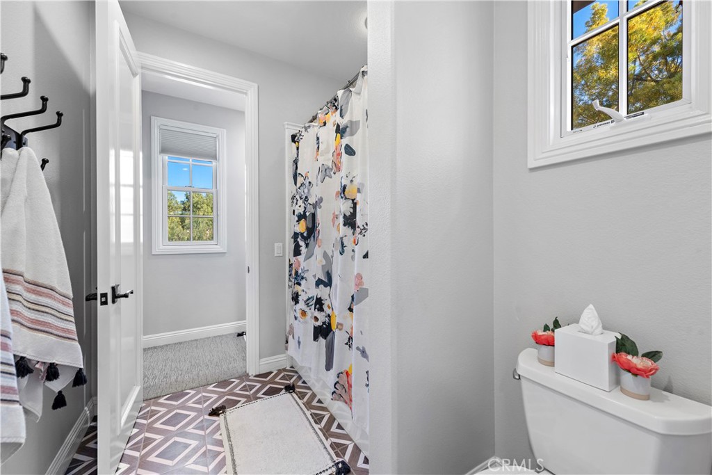 27 Pisano Street Ladera Ranch, CA 92694 - Photo 44 of 71 a bathroom with a sink toilet and shower