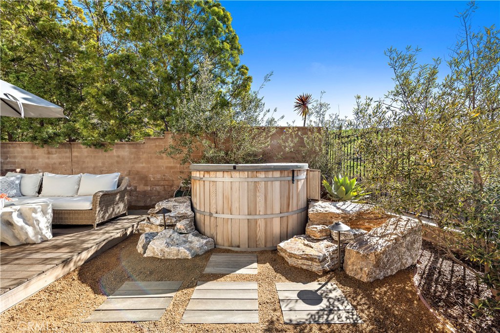 27 Pisano Street Ladera Ranch, CA 92694 - Photo 53 of 71 a view of a balcony with chairs and potted plants