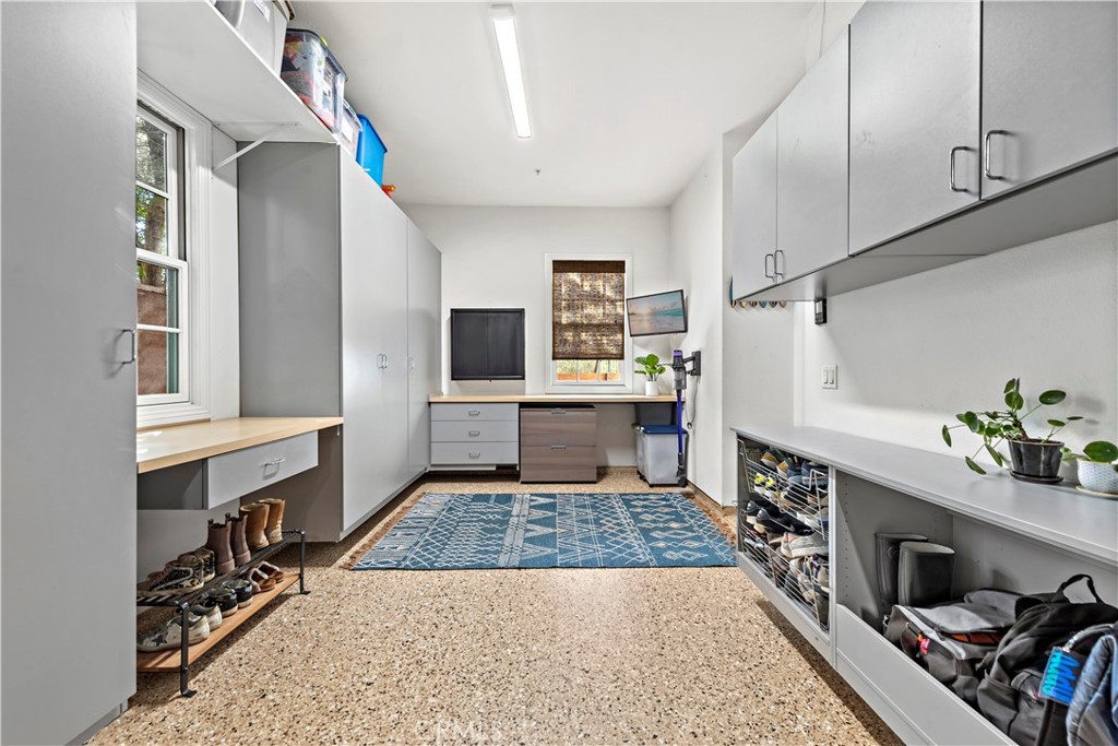 27 Pisano Street Ladera Ranch, CA 92694 - Photo 59 of 71 a kitchen with a sink and cabinets