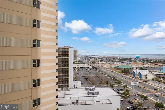 a view of a chair and table in the balcony