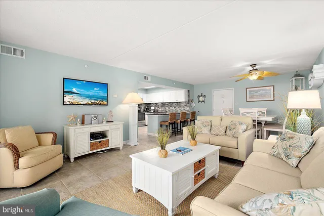 a living room with furniture and a couch