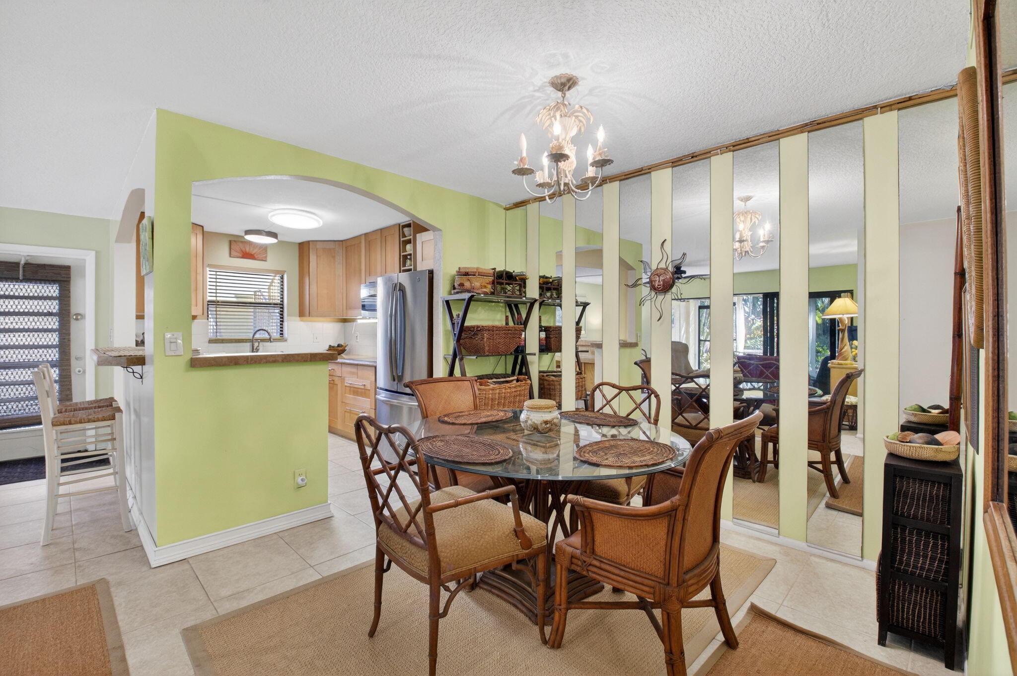 501 Dotterel Road, Unit 26B Delray Beach, FL 33444 - Photo 11 of 48 a view of a dining room with furniture window and wooden floor