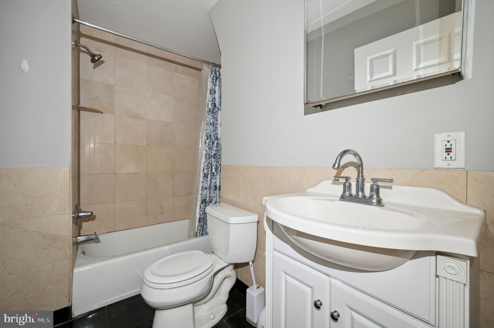 1723 Spruce Street Philadelphia, PA 19103 - Photo 15 of 24 a bathroom with a sink toilet and shower
