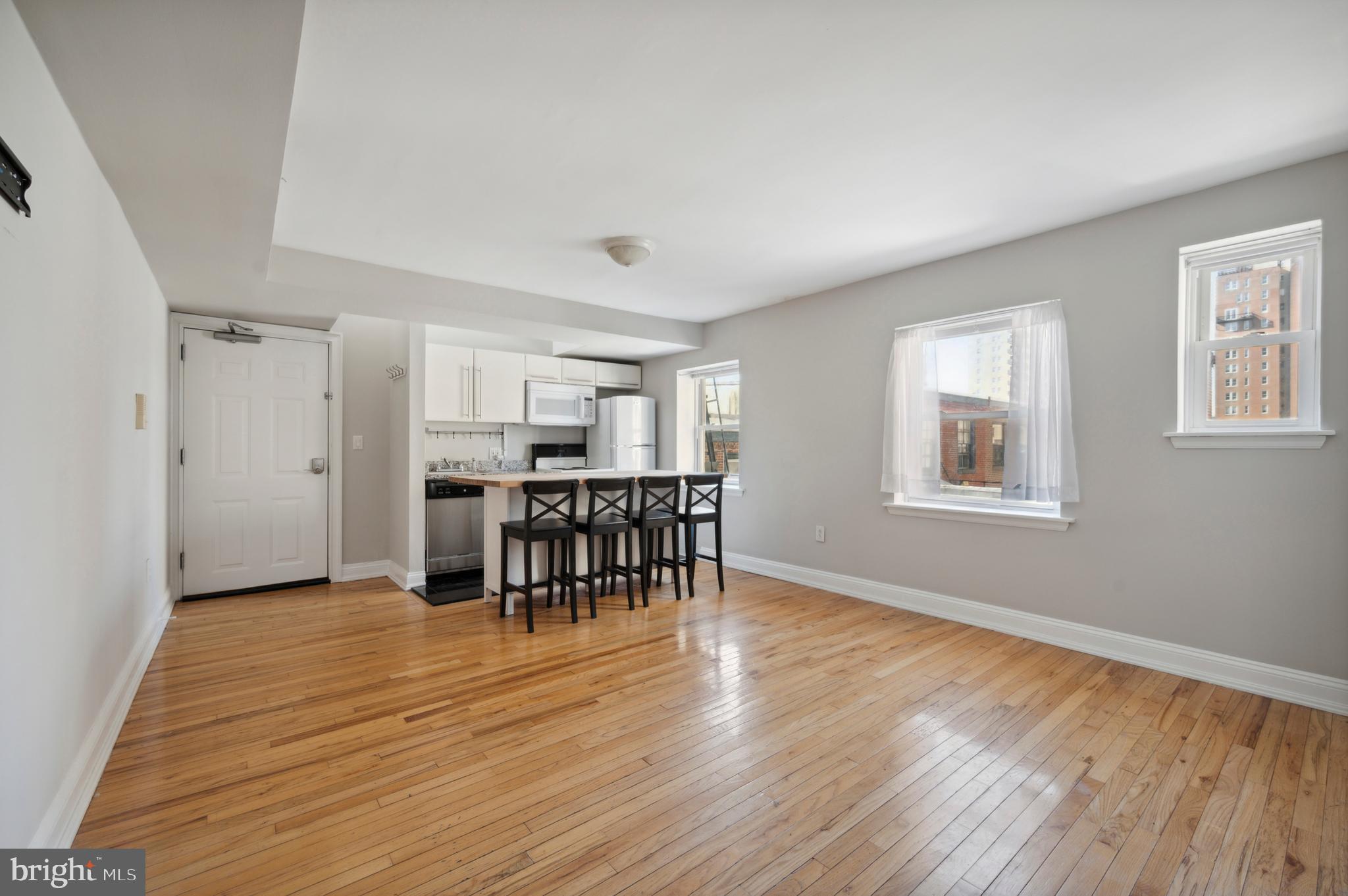 1723 Spruce Street Philadelphia, PA 19103 - Photo 17 of 24 a view of a livingroom with furniture and wooden floor