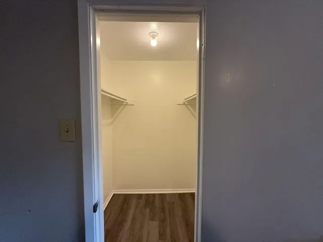 a bathroom with a shower and a tub