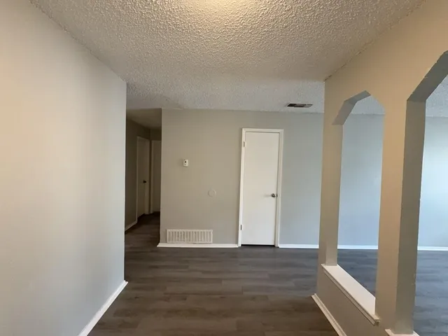 a kitchen that has a sink and a stove