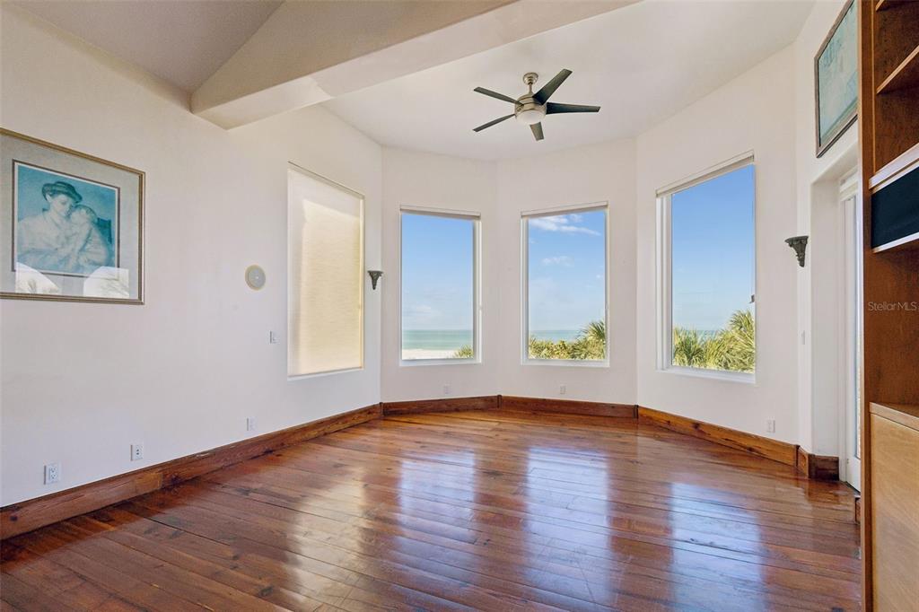 2811 Sunset Way St. Pete Beach, FL 33706 - Photo 51 of 97 a view of an empty room with window and wooden floor