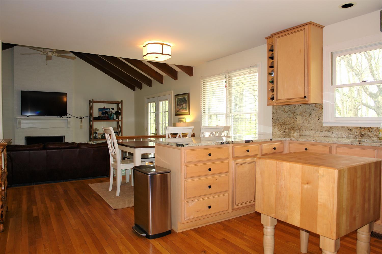 219 Darwin Road Southwest Roanoke, VA 24014 - Photo 15 of 58 a kitchen with a stove a sink and a refrigerator