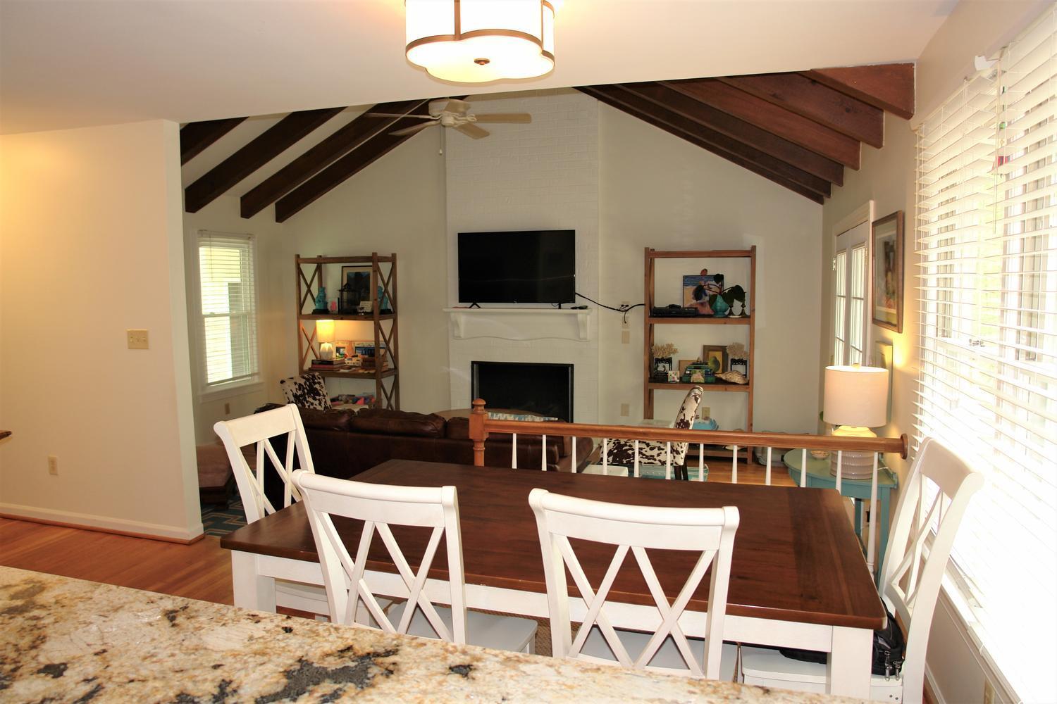 219 Darwin Road Southwest Roanoke, VA 24014 - Photo 16 of 58 a dining room with furniture and wooden floor
