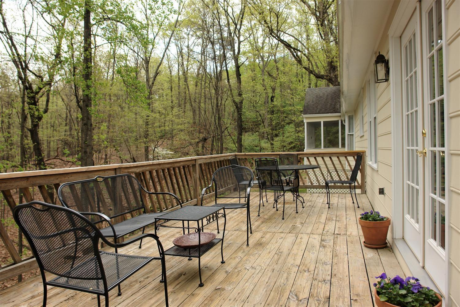 219 Darwin Road Southwest Roanoke, VA 24014 - Photo 20 of 58 a view of a chairs and table on the balcony