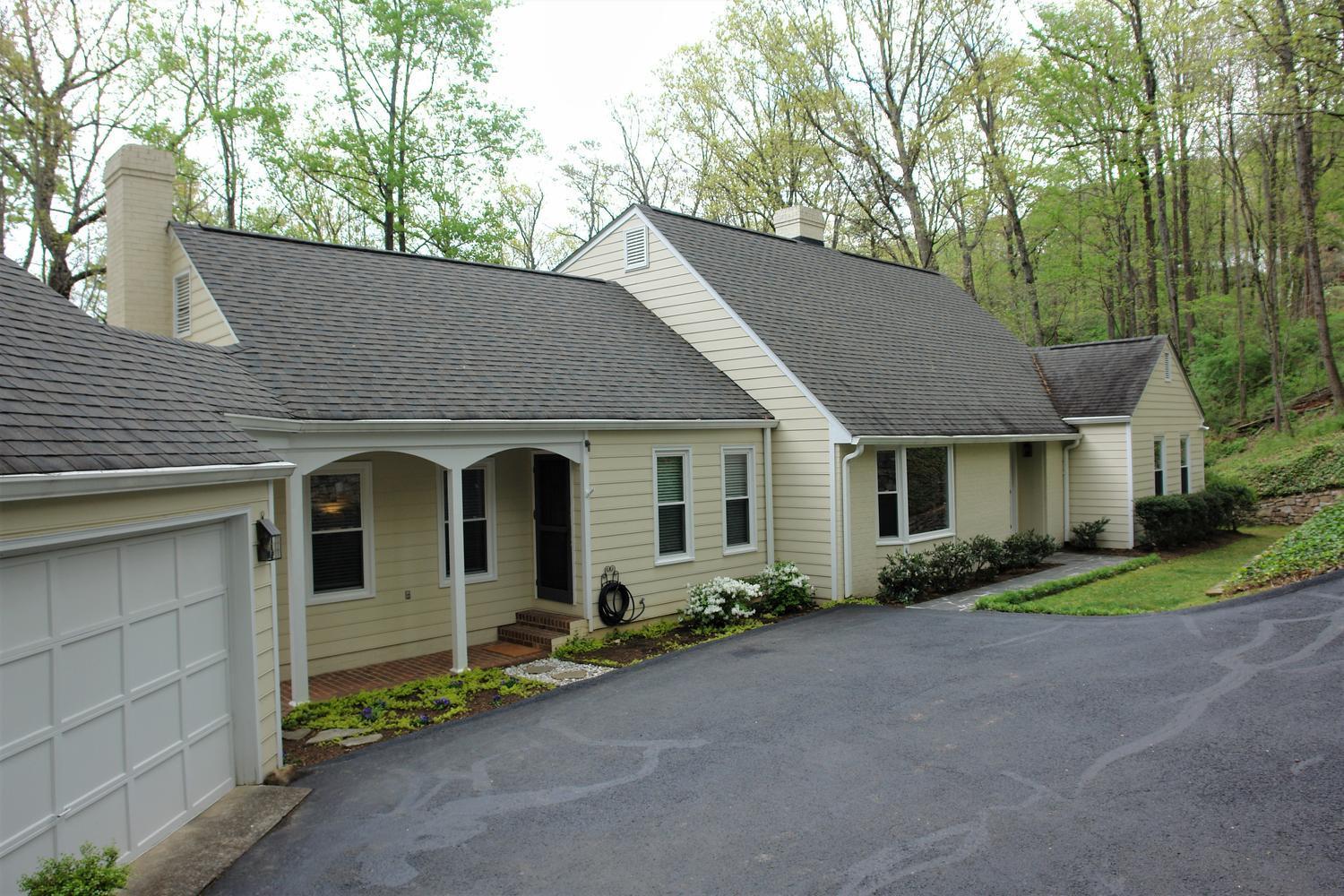 219 Darwin Road Southwest Roanoke, VA 24014 - Photo 3 of 58 a front view of a house with garden