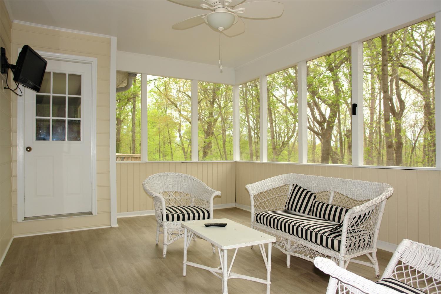 219 Darwin Road Southwest Roanoke, VA 24014 - Photo 28 of 58 a view of a dining room with furniture and wooden floor