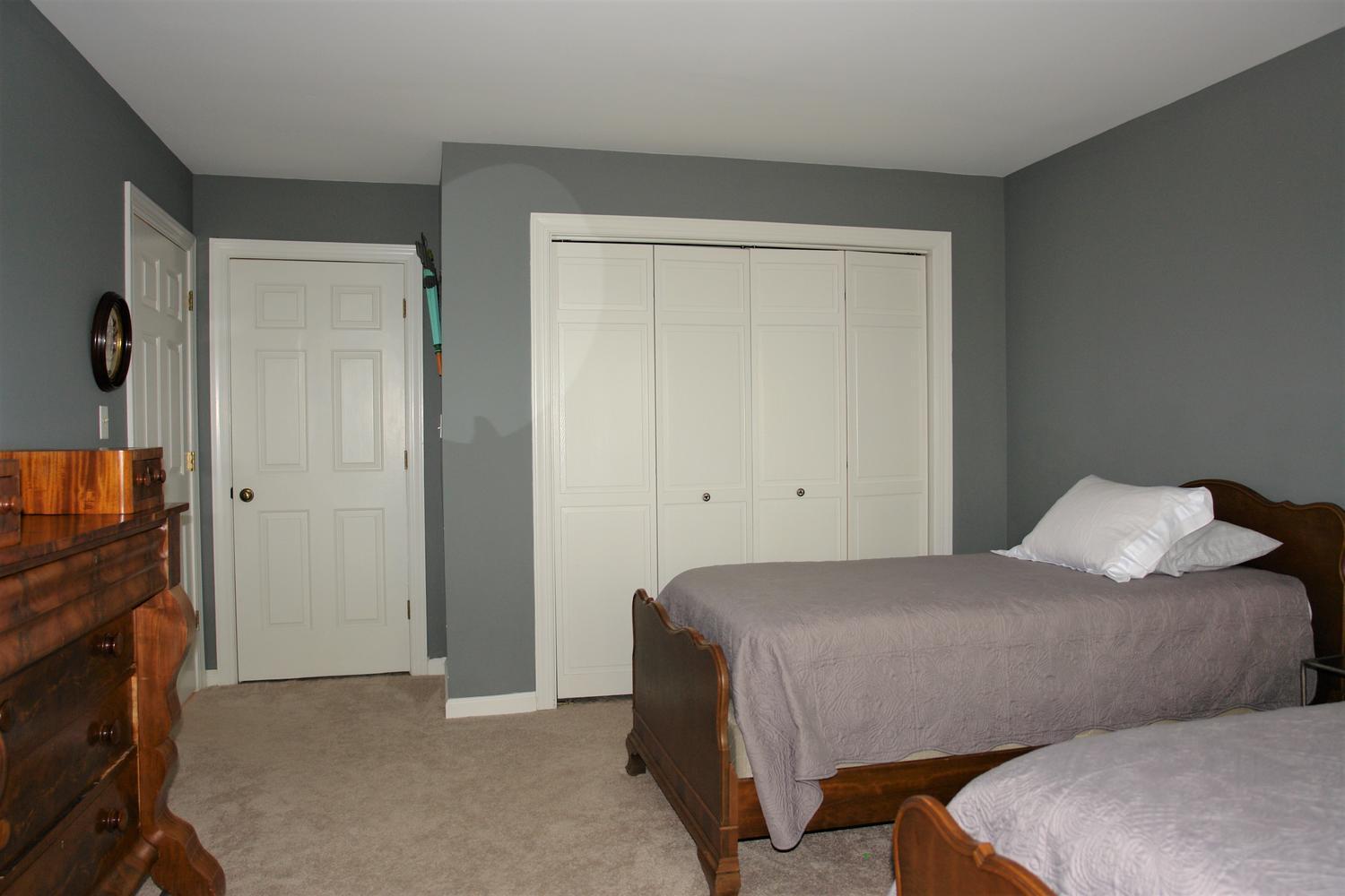 219 Darwin Road Southwest Roanoke, VA 24014 - Photo 35 of 58 a bedroom with a bed and a tv