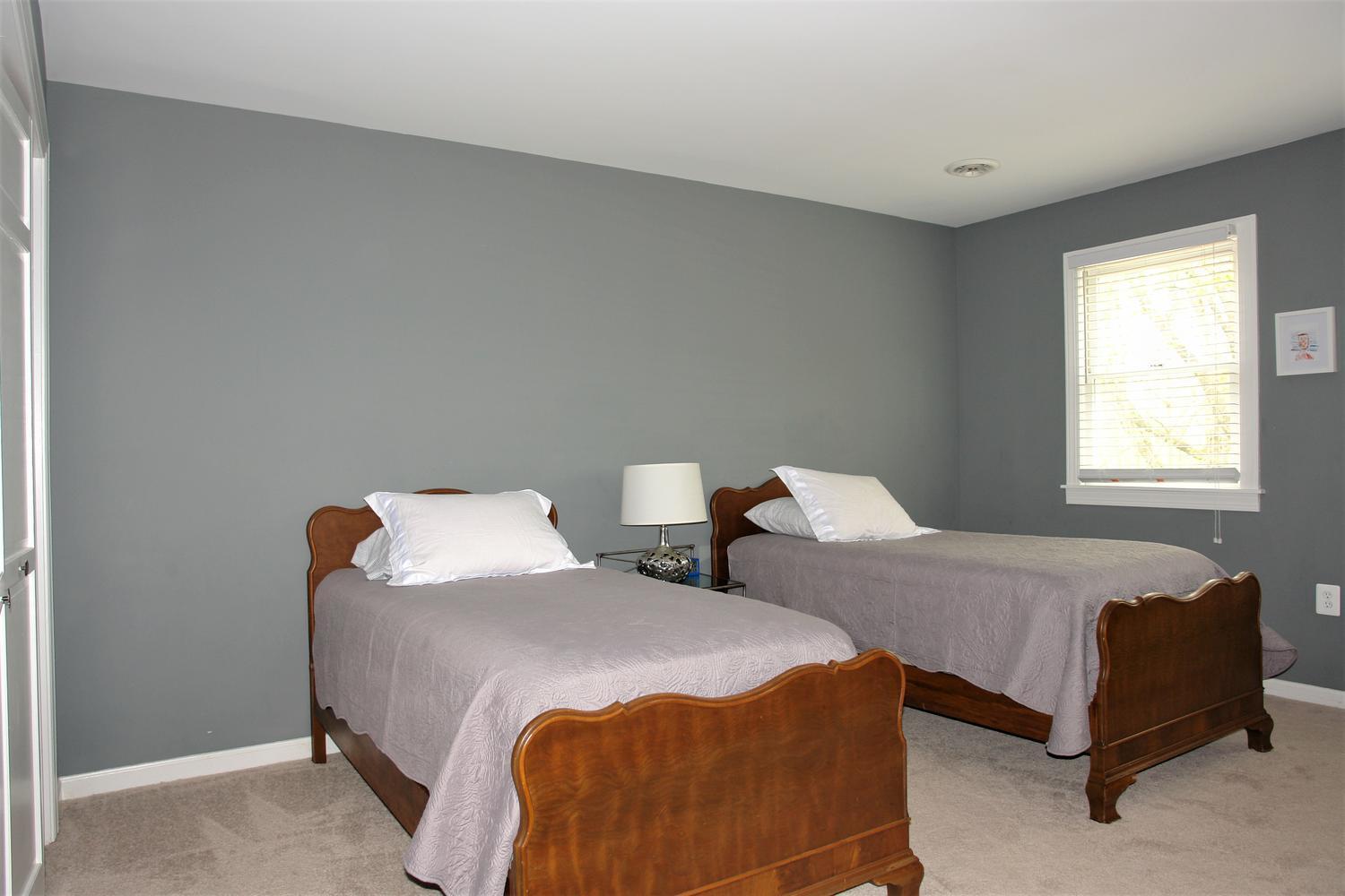 219 Darwin Road Southwest Roanoke, VA 24014 - Photo 36 of 58 a bedroom with two beds and a window