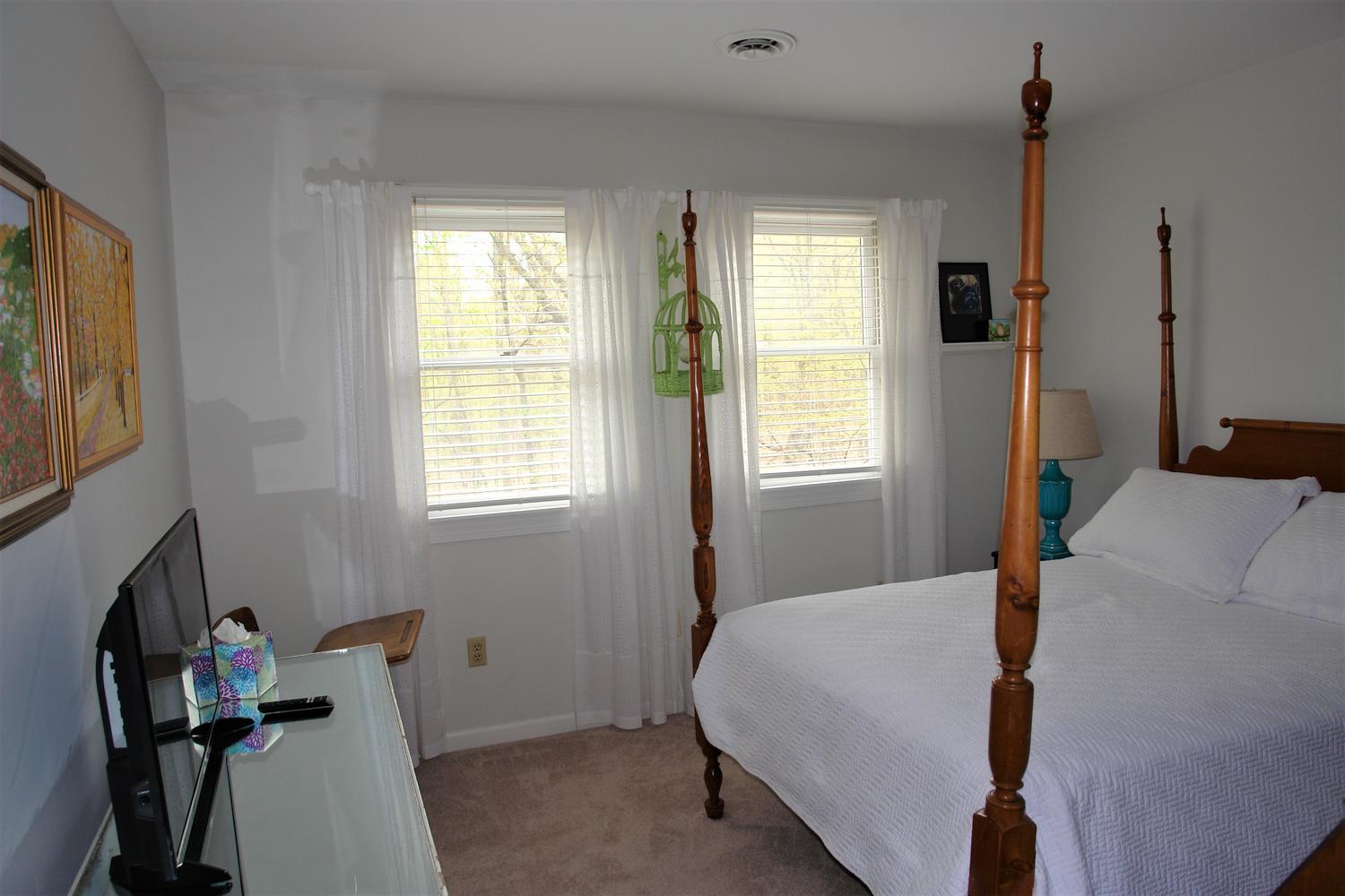219 Darwin Road Southwest Roanoke, VA 24014 - Photo 37 of 58 a bed room with a bed and a window