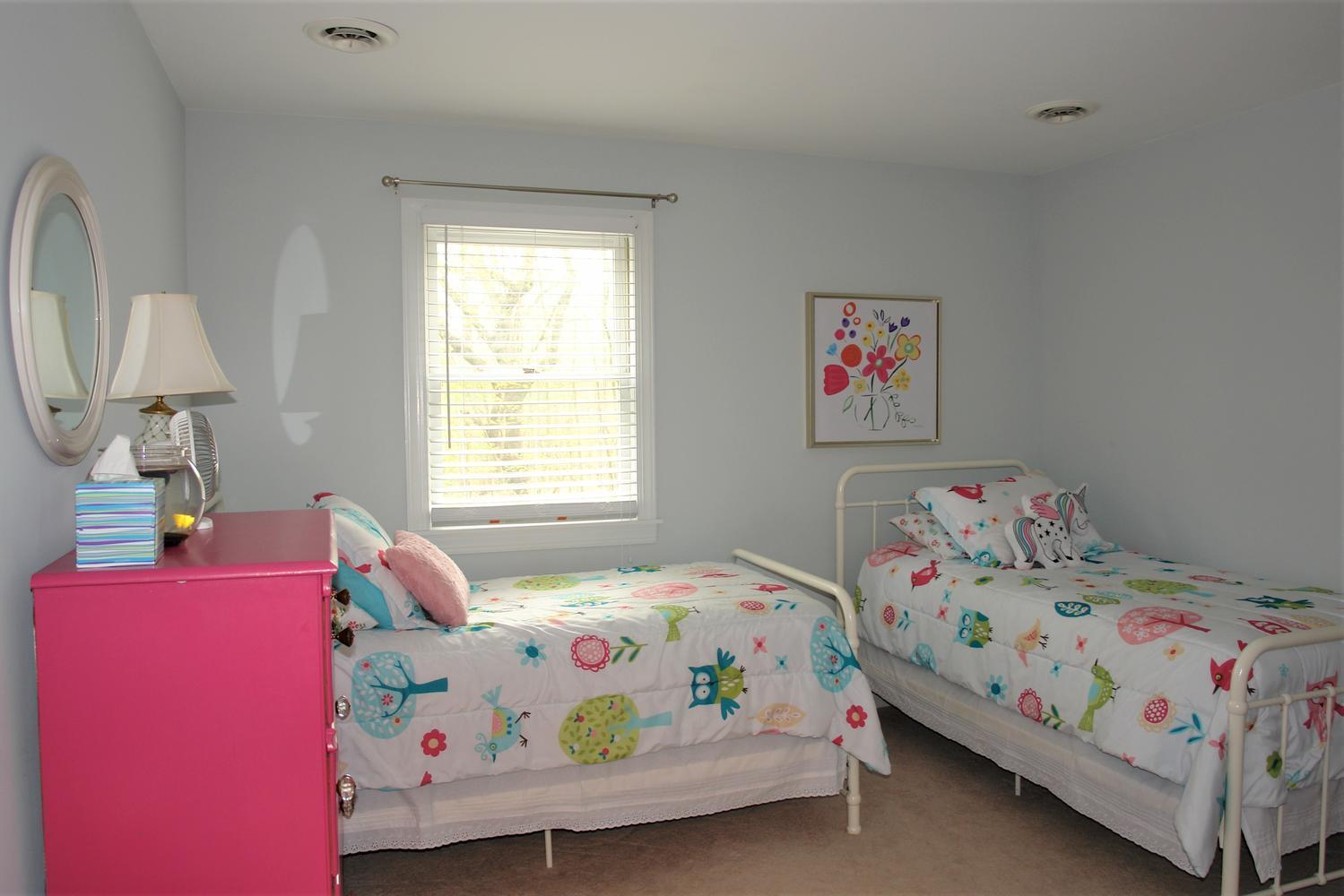 219 Darwin Road Southwest Roanoke, VA 24014 - Photo 40 of 58 a bedroom with a bed and a window