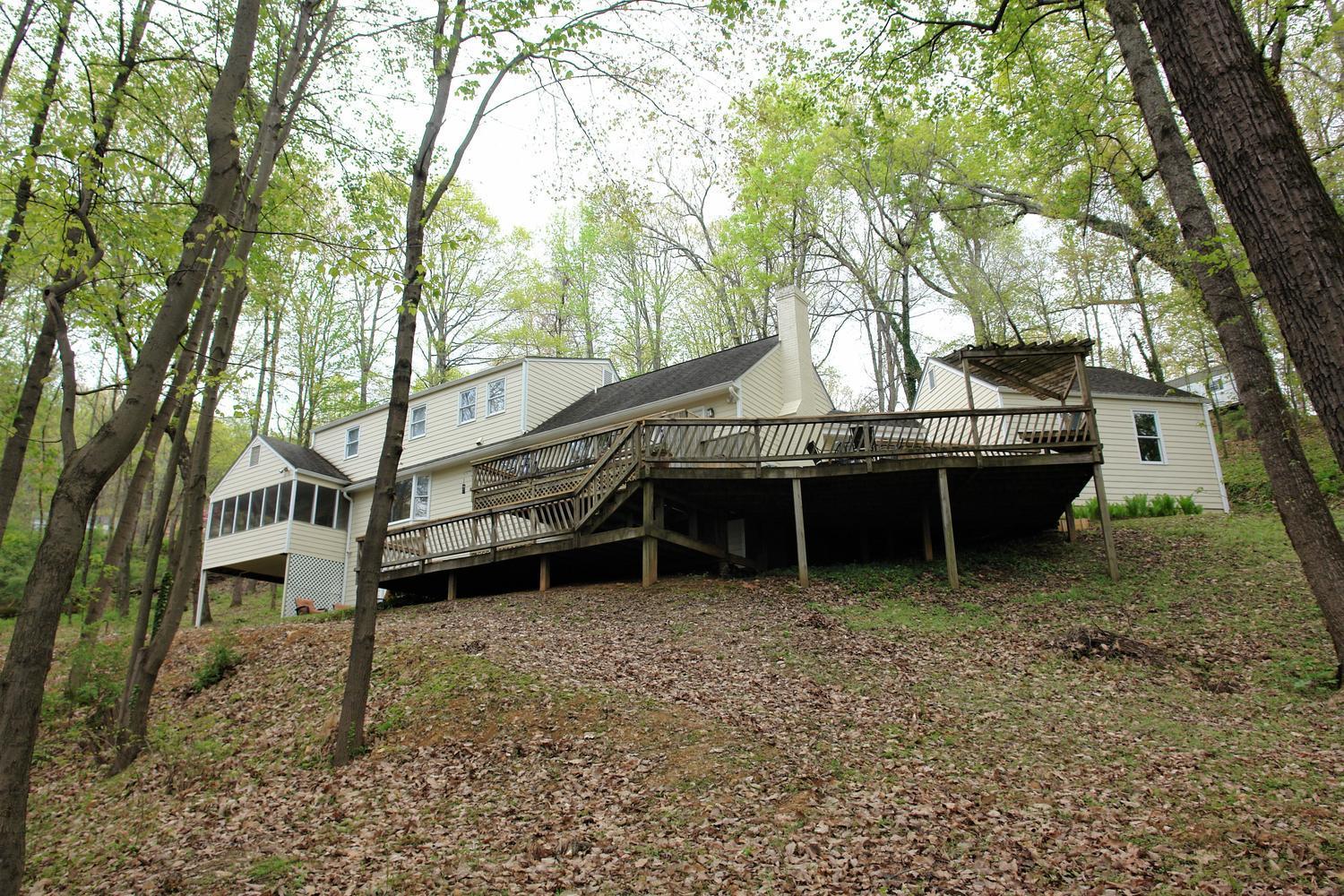 219 Darwin Road Southwest Roanoke, VA 24014 - Photo 49 of 58 a view of a house with a yard and sitting area