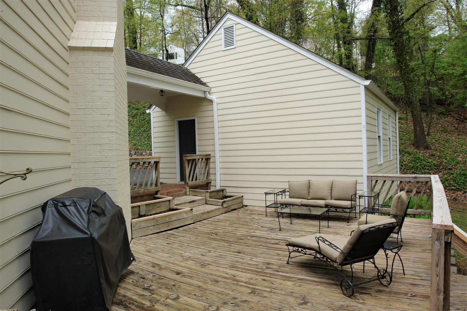 219 Darwin Road Southwest Roanoke, VA 24014 - Photo 51 of 58 a roof deck with couches and wooden floor
