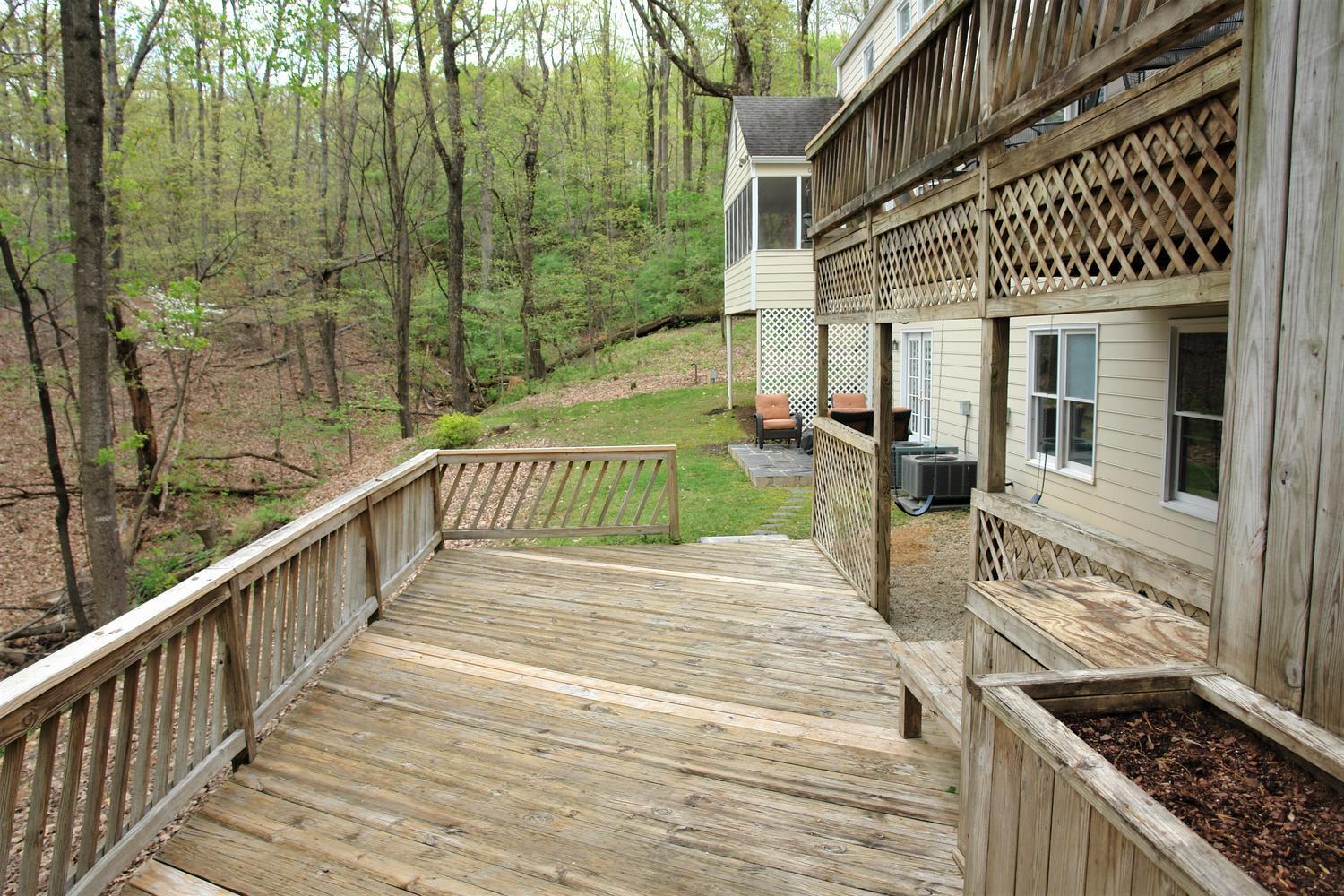 219 Darwin Road Southwest Roanoke, VA 24014 - Photo 53 of 58 a view of a porch with wooden floor and fence